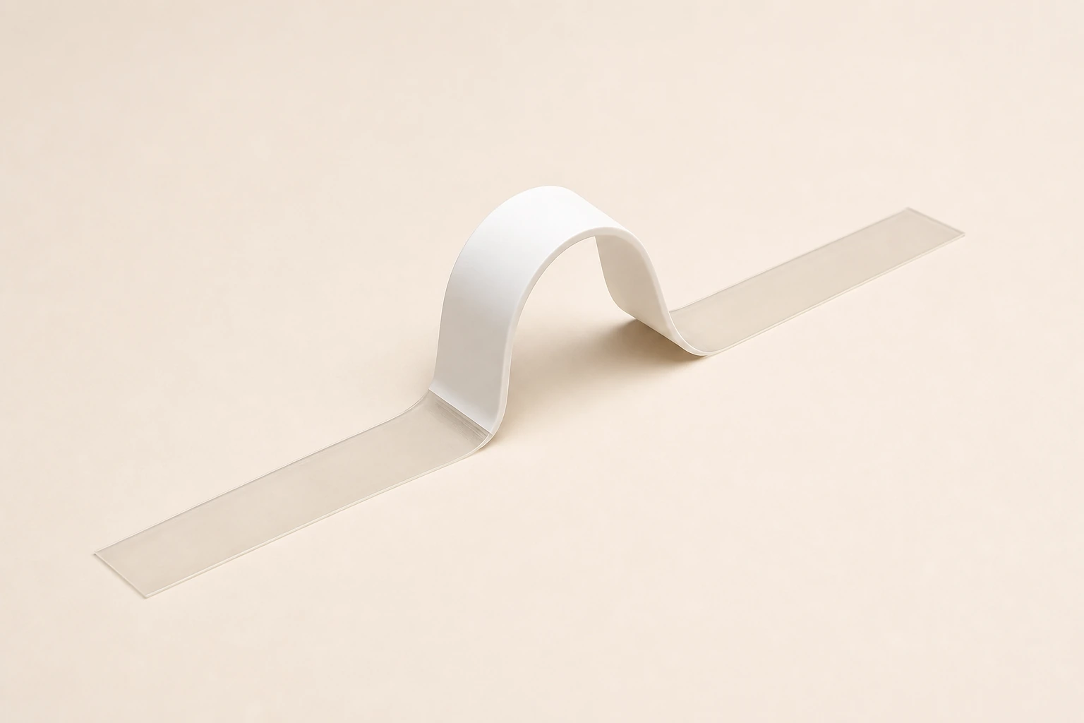 White flexible adhesive carry handle with two long transparent adhesive tabs